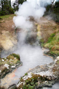 High angle view of smoke emitting from water