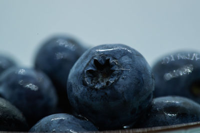 Close-up of blueberries on rock