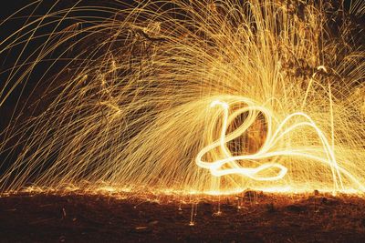 Light painting on field at night