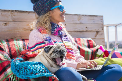 Portrait of woman with dog