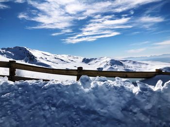 Snow covered mountains against sky