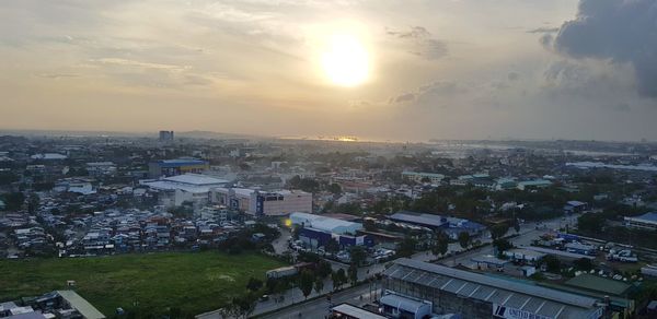 High angle view of townscape against sky during sunset