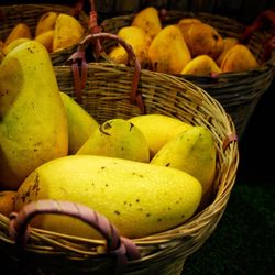 Close-up of fruits in basket for sale at market