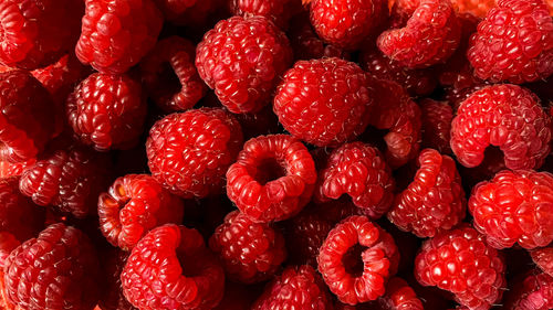 Raspberry background. full frame textured berry background. healthy lifestyle and  eating concept
