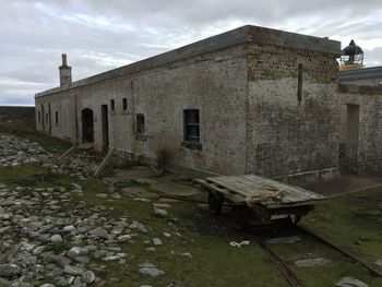 Abandoned built structure against sky