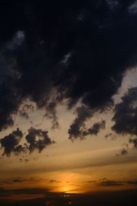 Low angle view of dramatic sky during sunset