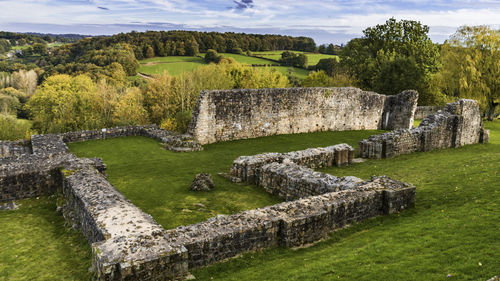 View of old ruins against cloudy sky