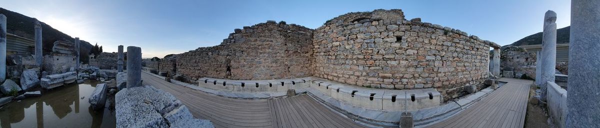 Panoramic view of old building in city against sky