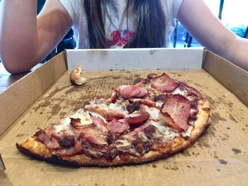 Close-up of pizza on cutting board