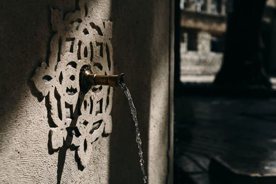 Close-up of text on wall