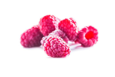 Close-up of strawberry over white background