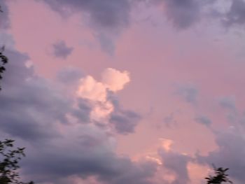 Low angle view of clouds in sky during sunset