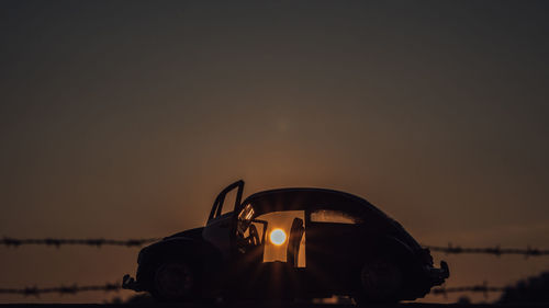 Man in car at night