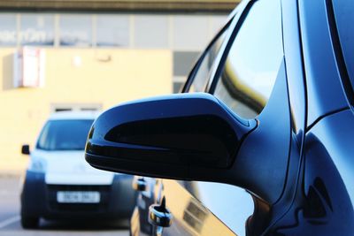 Close-up of car side-view mirror