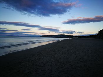 Scenic view of sea at sunset