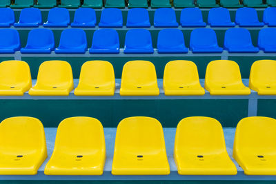 Full frame shot of empty seats in stadium