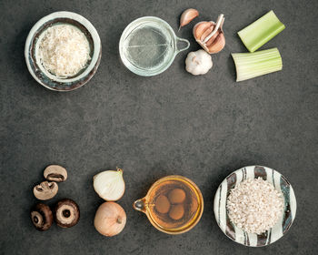 Directly above shot of various food on gray table