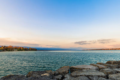 Scenic view of sea against sky during sunset