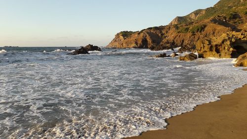 Scenic view of sea against clear sky