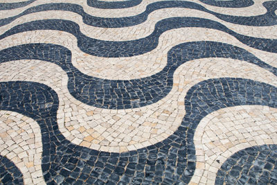 Full frame shot of curvy patterned footpath