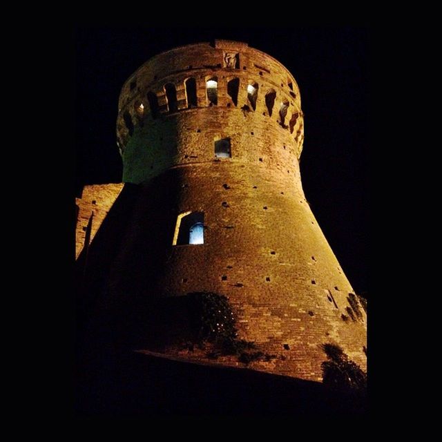 architecture, built structure, building exterior, low angle view, history, night, old, clear sky, dark, arch, tower, the past, no people, ancient, copy space, sky, outdoors, window, building, old ruin