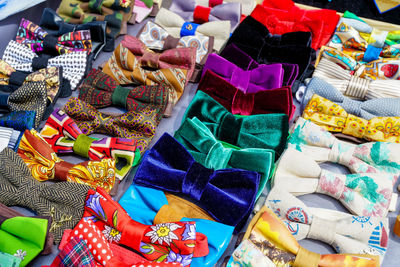 High angle view of colorful bow ties displayed for sale at market stall