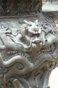 Close-up of buddha statue in temple