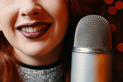 Close-up portrait of a smiling young woman