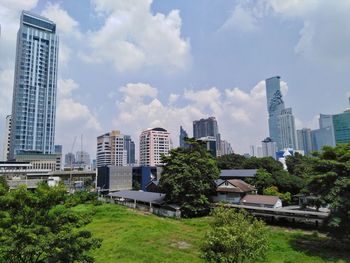 Buildings in city against sky