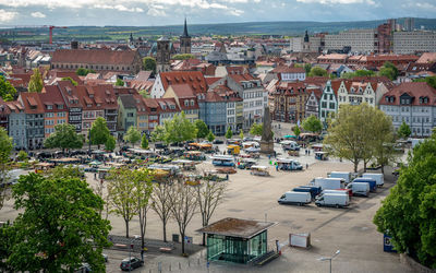 High angle view of townscape by road in city