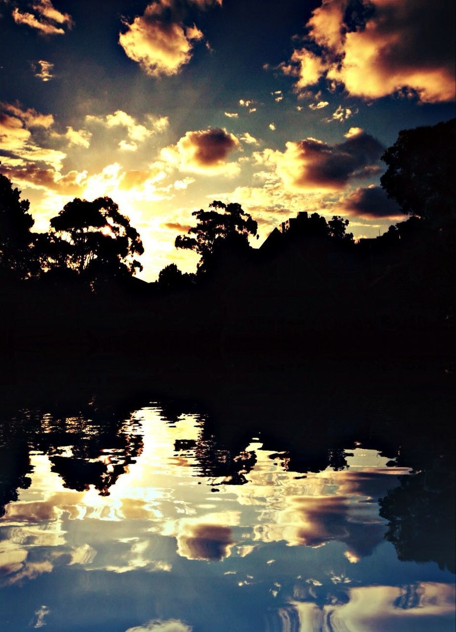 sunset, water, reflection, sky, silhouette, tranquil scene, scenics, tranquility, lake, beauty in nature, waterfront, cloud - sky, nature, idyllic, tree, orange color, dusk, cloud, rock - object, outdoors