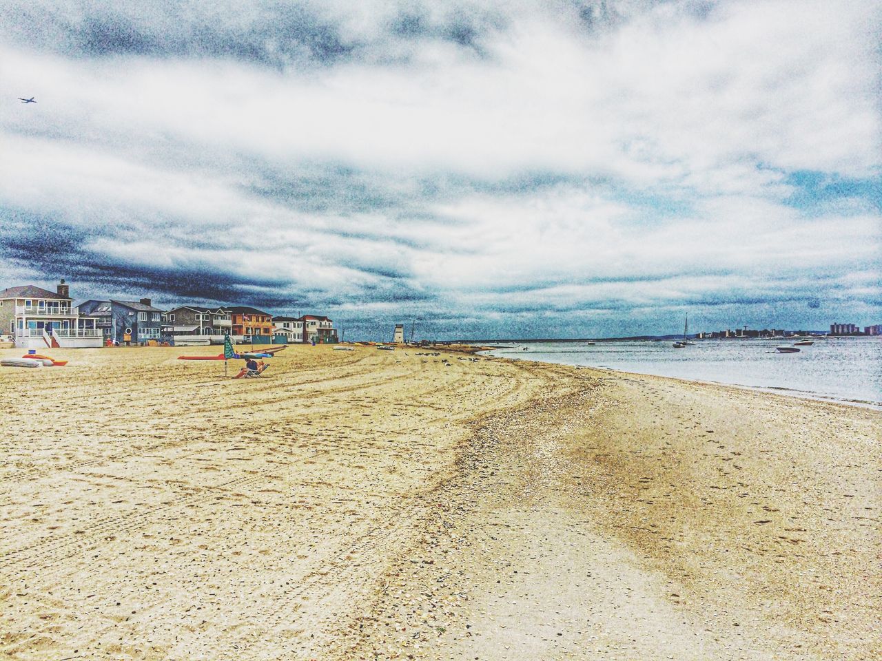 beach, sand, sea, sky, water, shore, horizon over water, tranquility, tranquil scene, cloud - sky, scenics, nature, day, incidental people, pier, outdoors, beauty in nature, cloud, vacations, cloudy