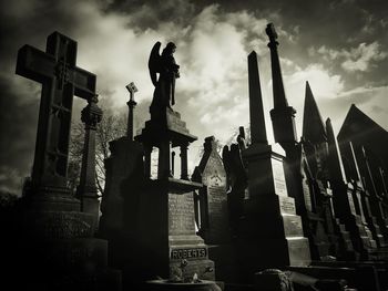 Low angle view of statue against sky