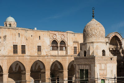 Low angle view of historic building against sky