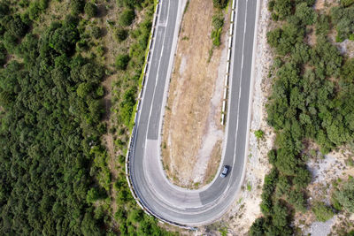 High angle view of highway amidst trees