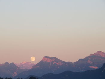 Full moon in sky and mountain