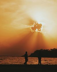 Scenic view of sea at sunset