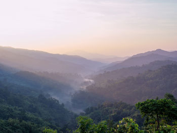 Beautiful nature of hills and mountain are complex with the atmosphere of the morning sunrise.