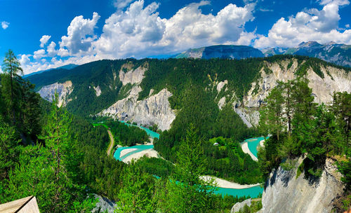 Panoramic view of landscape against cloudy sky