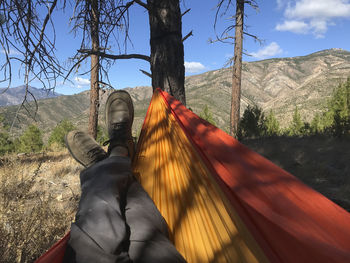 Hanging out in hammock with boots