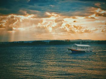 Scenic view of sea at sunset