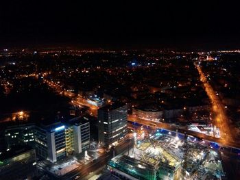 Illuminated cityscape at night