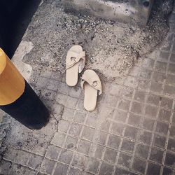 High angle view of footwear on floor