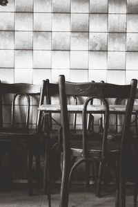 Empty chairs and table in cafe