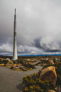 Scenic view of smoke stack against sky