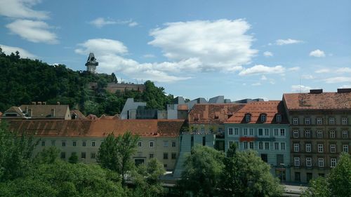 Houses against sky in city
