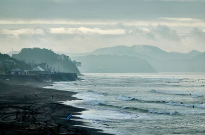 Scenic view of sea and beach against sky