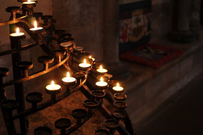 Close-up of lit tea light candles