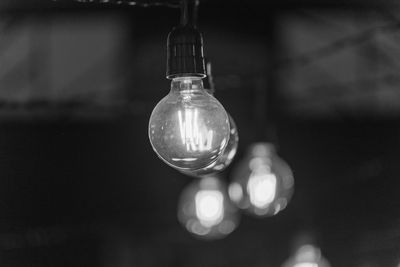 Close-up of illuminated light bulb