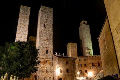 Low angle view of historic building at night